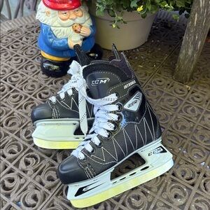 CCM Black and White Hockey Skates with Silver Accents
